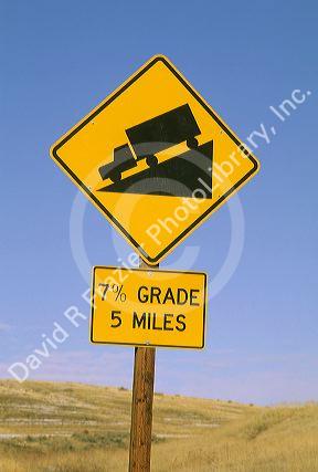 Highway advisory sign for 7% hill gradation. 