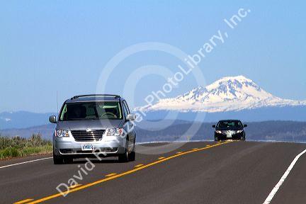 Automobiles travel on U.S. Route 20 east of Bend, Oregon, USA.