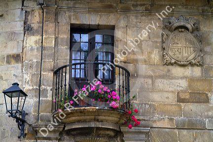 Coat of arms carved in a stone wall at Santillana del Mar, Cantabria, Spain.