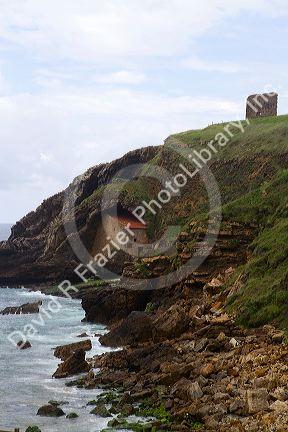 Santa Justa Beach and old monastery near the town of Ubiarco, Cantabria, Spain.