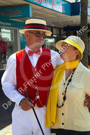 A couple dressed in period clothing during the Tremains Art Deco Weekend at Napier in the Hawke's Bay Region, North Island, New Zealand.