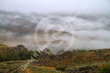 Fog blanketing the mountains along US 20 in Elmore County, Idaho, USA.