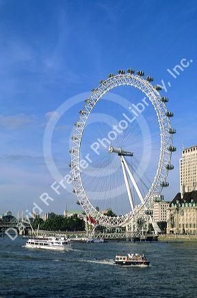 London Eye ferris wheel along the Thames River in London, England.