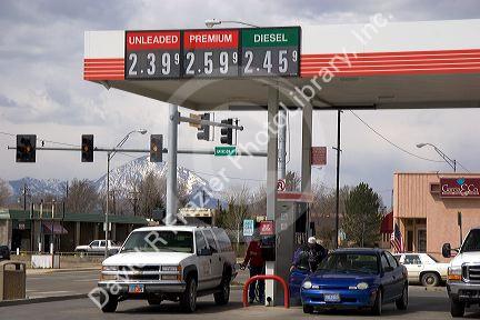 People fueling up at a gas station in Utah.