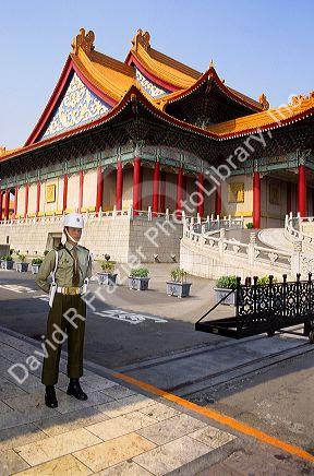 A guard stands in front of the theater at Chiang Kai-Shek Memorial in Taipei, Taiwan.