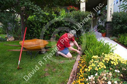 Landscaping being done outside of a new residence in Boise, Idaho.