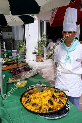 A traditional dish of Paella with fish and rice in Southern Spain.