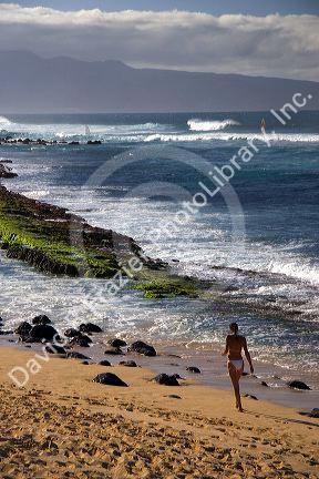 A beach scene in Maui, Hawaii at Lower Paia Beach.