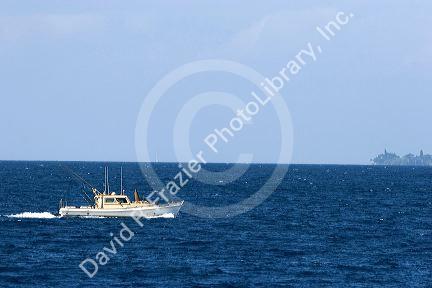 A fishing boat in the pacific ocean off the island of Maui, Hawaii.