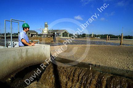 Sewage treatment plant in Boise, Idaho.  Sludge is aerated in treatment process.
