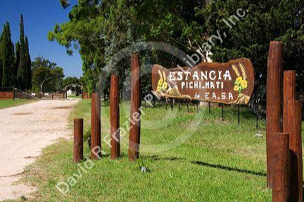 Entrance to farm ranch estancia near Tamil, Argentina.