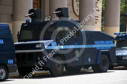 Police riot vehicles parked in front of the Metropolitan Cathedral in Buenos Aires, Argentina.