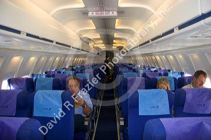 The interior of a Lan Airlines Boeing 737 airplane with passengers on board in Buenos Aires, Argentina.