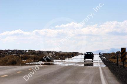 Mirage on U.S. 95 near Fallon, Nevada.  Heat waves create the illusion of water on the paved surface of the road.