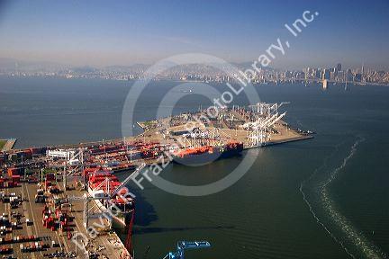Container ships and cranes at the Port of Oakland, in the bay area of California.