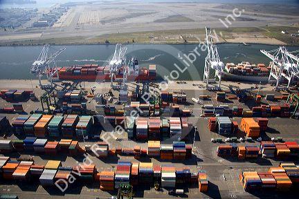 Container ships and cranes at the Port of Oakland, in the bay area of California.