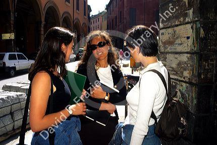 University students talk at Bologna, Italy.