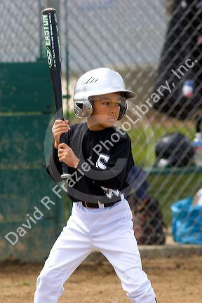 Little League baseball player at bat in a game at Morgan Hill, California.