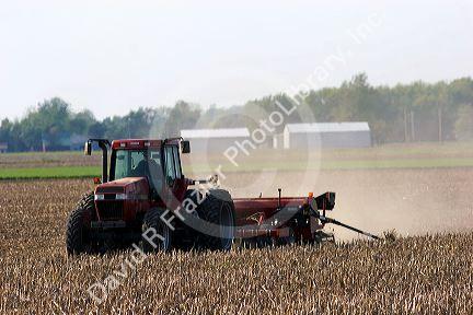 Tractor planting soy beans in the Ohio plains.