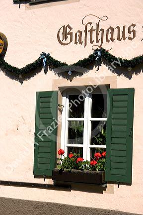 Window with flower box on a hotel in the alpine village of Garmisch, Germany.