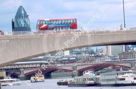 Busy London city scene viewed from the River Thames.