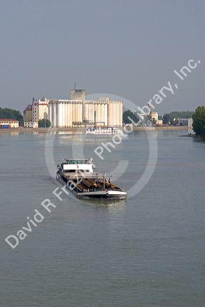 Barge on the Rhine River between France and Germany near Frieberg, Germany.