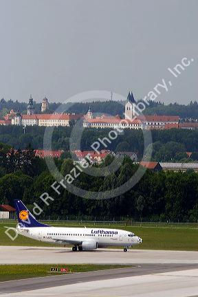Lufthansa Boeing 737 airplane landing at Munich airport, Germany.