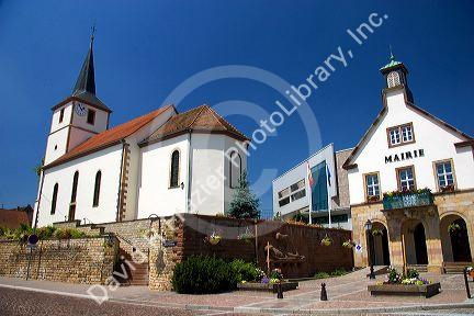 Protestant church and municipal offices at the village of Betschdorf, France.