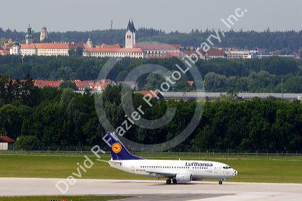 Lufthansa Boeing 737 airplane landing at Munich airport, Germany.