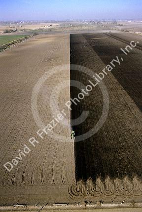 Aerial view of tractor plowing field in Canyon county, Idaho.