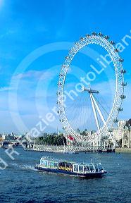 London eye Ferris wheel along the Thames River in London, England.