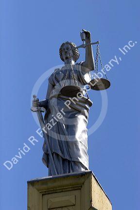 Scales of Justice atop the Franklin County Courthouse in Ottawa, Kansas.