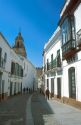 View of a narrow street in ancient Roman town of Carmona, Spain.