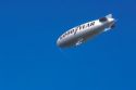Goodyear blimp filled with helium in flight.
