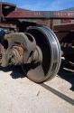 Iron wheel on a railroad car.