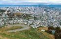 A view from twin peaks down Market Street in San Francisco, California.  Panoramic view of cityscape.