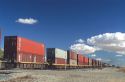 Piggyback containers on a train.