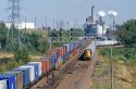 A train traveling in front of an ethanol corn processing plant in Clinton, Iowa.