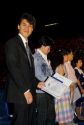 A new american citizen displays a certificate at a citizenship ceremony in Boise, Idaho.
