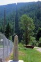 A marker that shows the international boundary of the United States of America and Canada border in East Port, Idaho.