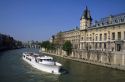 A tour boat on the River Seine passes the Criminal Court in Paris, France.