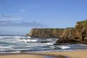 Waves crash onto the beach north of Santa Cruz, Califronia.