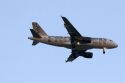 Frontier airlines Airbus 320 in flight.