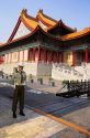 A guard stands in front of the theater at Chiang Kai-Shek Memorial in Taipei, Taiwan.