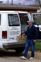 A volunteer delivers food from Meals on Wheels in Boise, Idaho.
