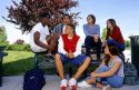 A group of milti ethnic teenage high school students hanging out. MR