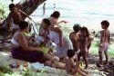 Tahitain family on a Sunday picnic along the Pacific Ocean.