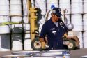 Technician using a Geiger Counter to sample radioactive waste at a storage facility in Idaho.