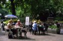 People having tea in the park, London, England.