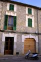 Residence with scooter parked outside in Majorca, Spain.